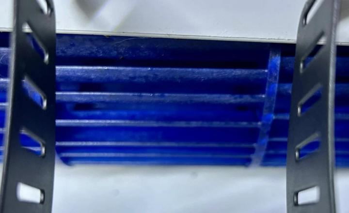 Clean blue evaporator coil after professional HVAC and duct cleaning service